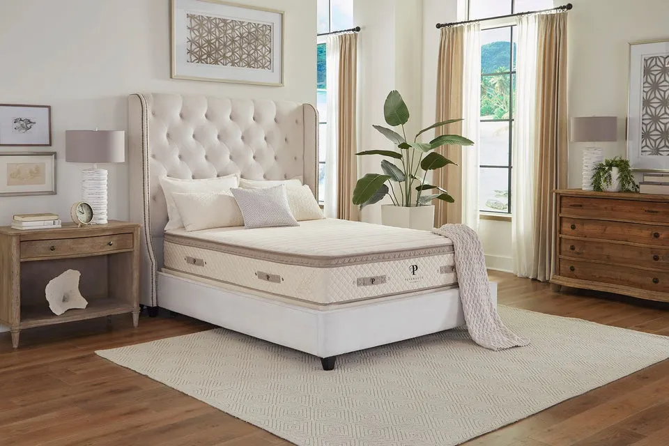 PlushBeds Luxury Bliss organic hybrid latex mattress styled in a bedroom