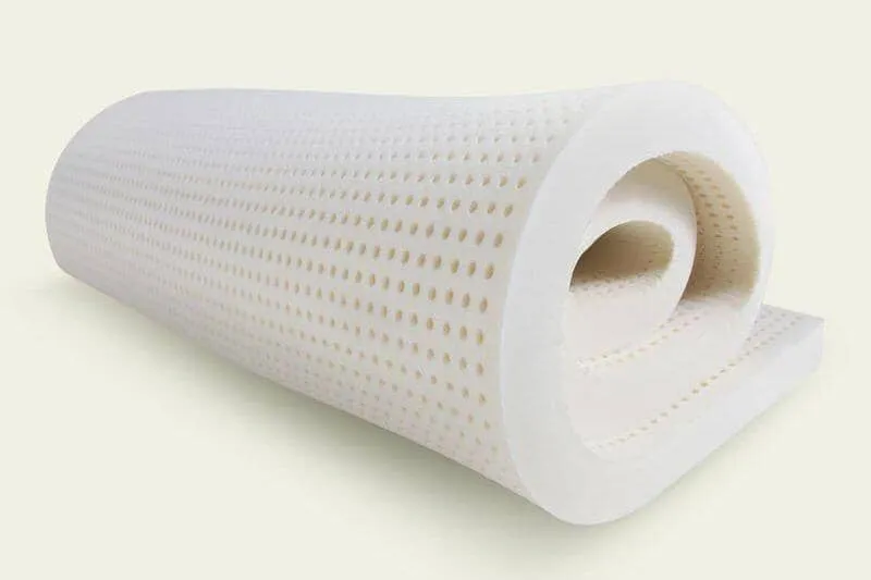 PlushBeds Organic Latex Mattress Topper, a rolled natural latex topper with a ventilated pinhole surface